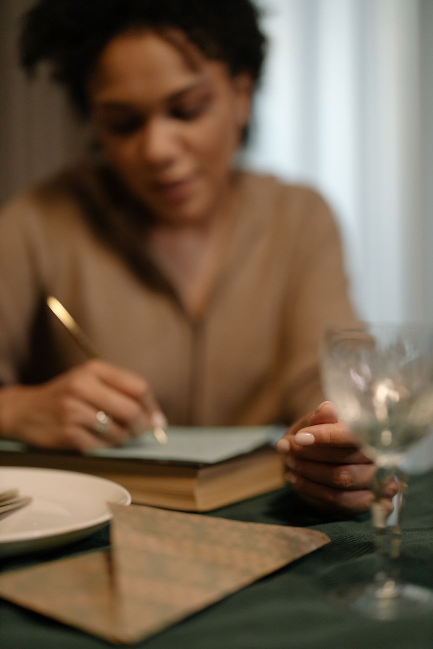 a woman sitting at the table